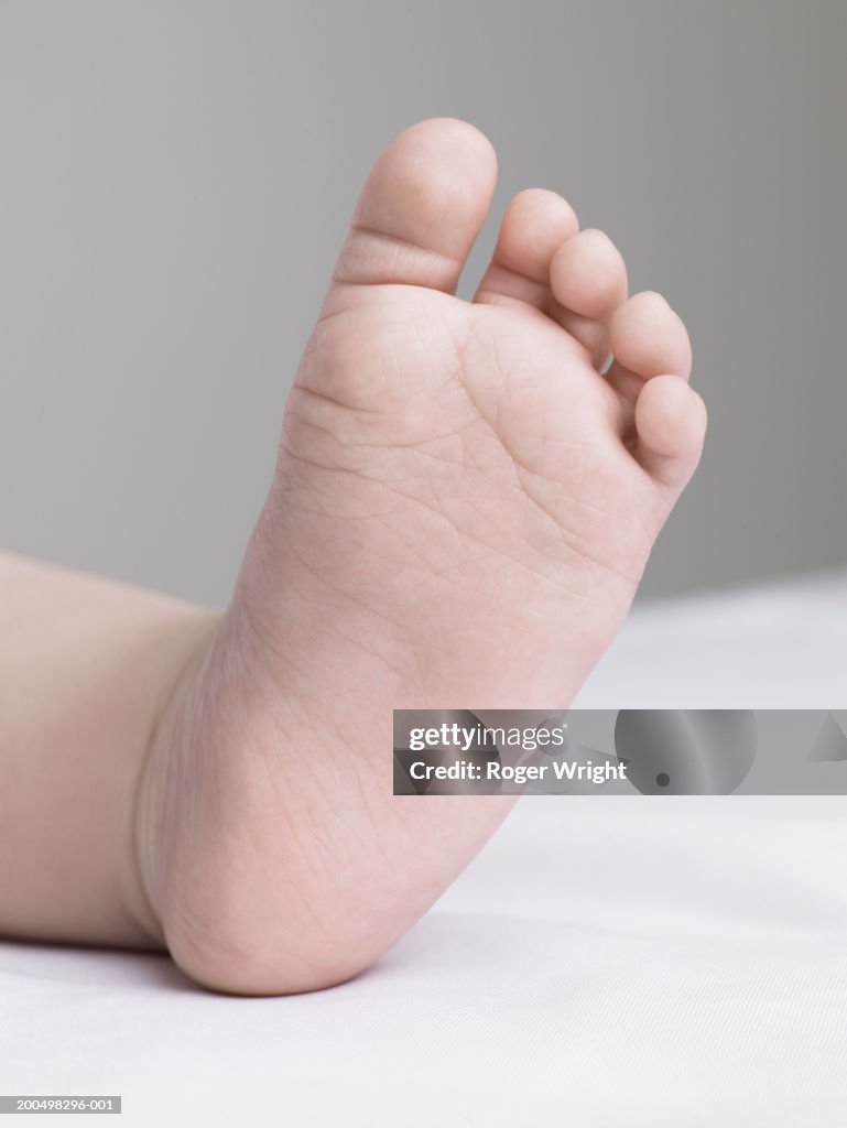 Baby girl (6-9 months), close-up of foot