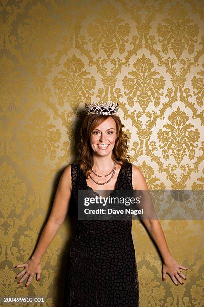 woman wearing tiarra, smiling, portrait - woman tiara stock pictures, royalty-free photos & images