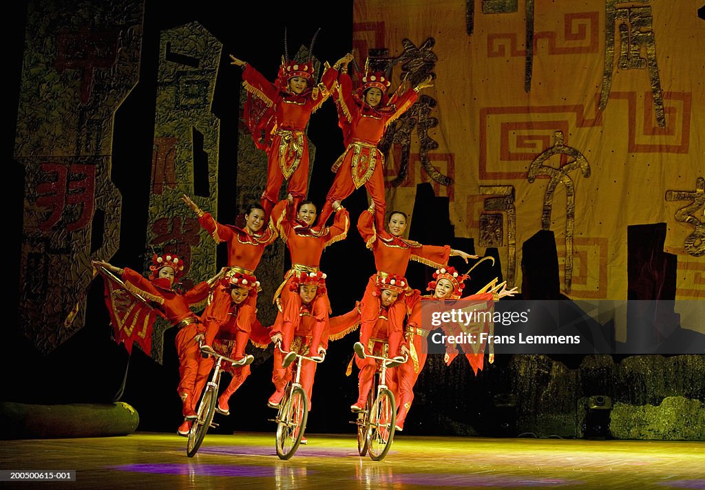 China, Beijing, Chaoyang Theatre, acrobats performing on bicycles
