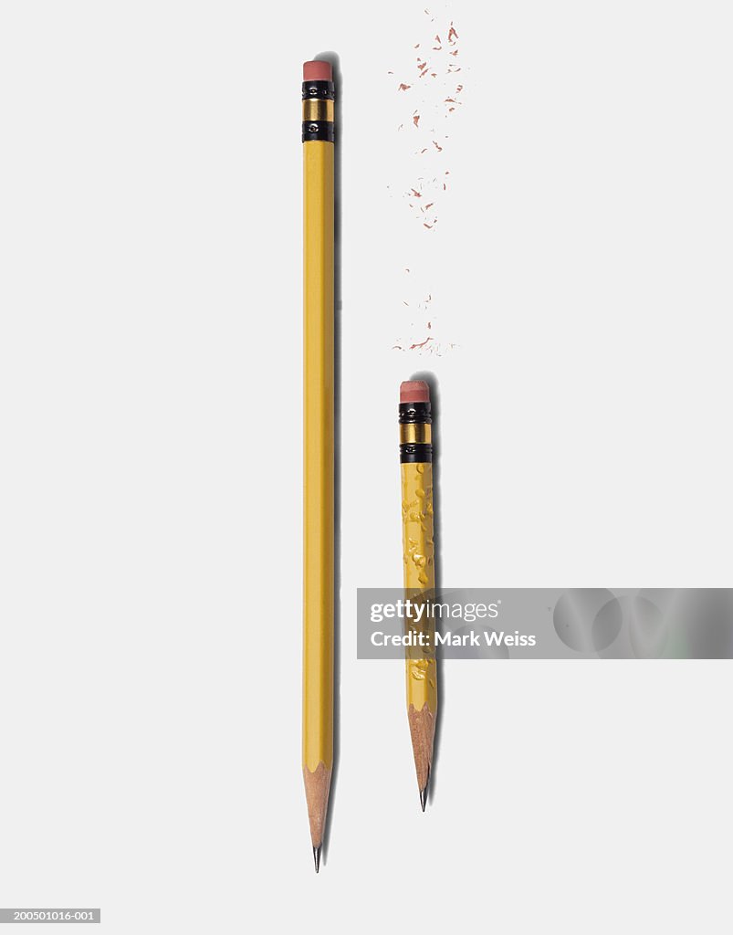 Long sharp pencil and short chewed pencil