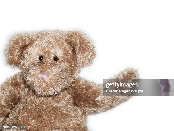 teddy bear waving - teddy bear on white foto e immagini stock