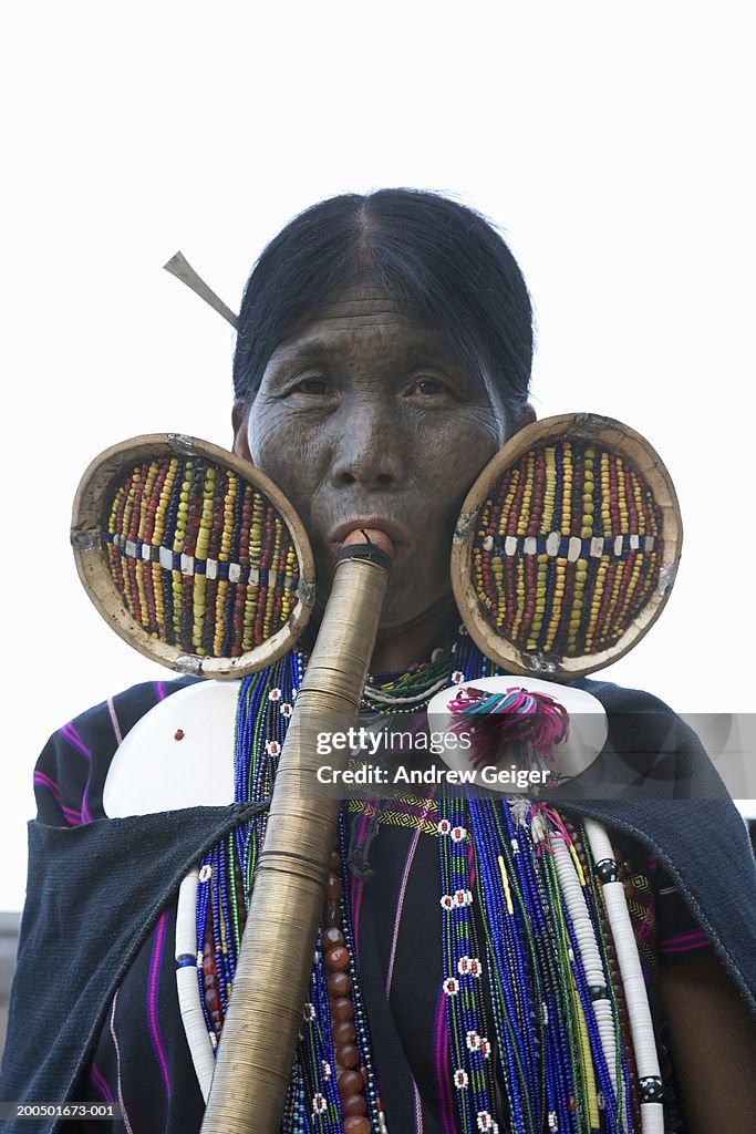 Myanmar, Chin State, Mindat, Chin woman smoking gord pipe