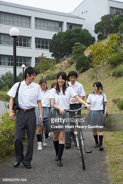 group of students (15-18) walking on footpath beside school - only japanese stock pictures, royalty-free photos & images