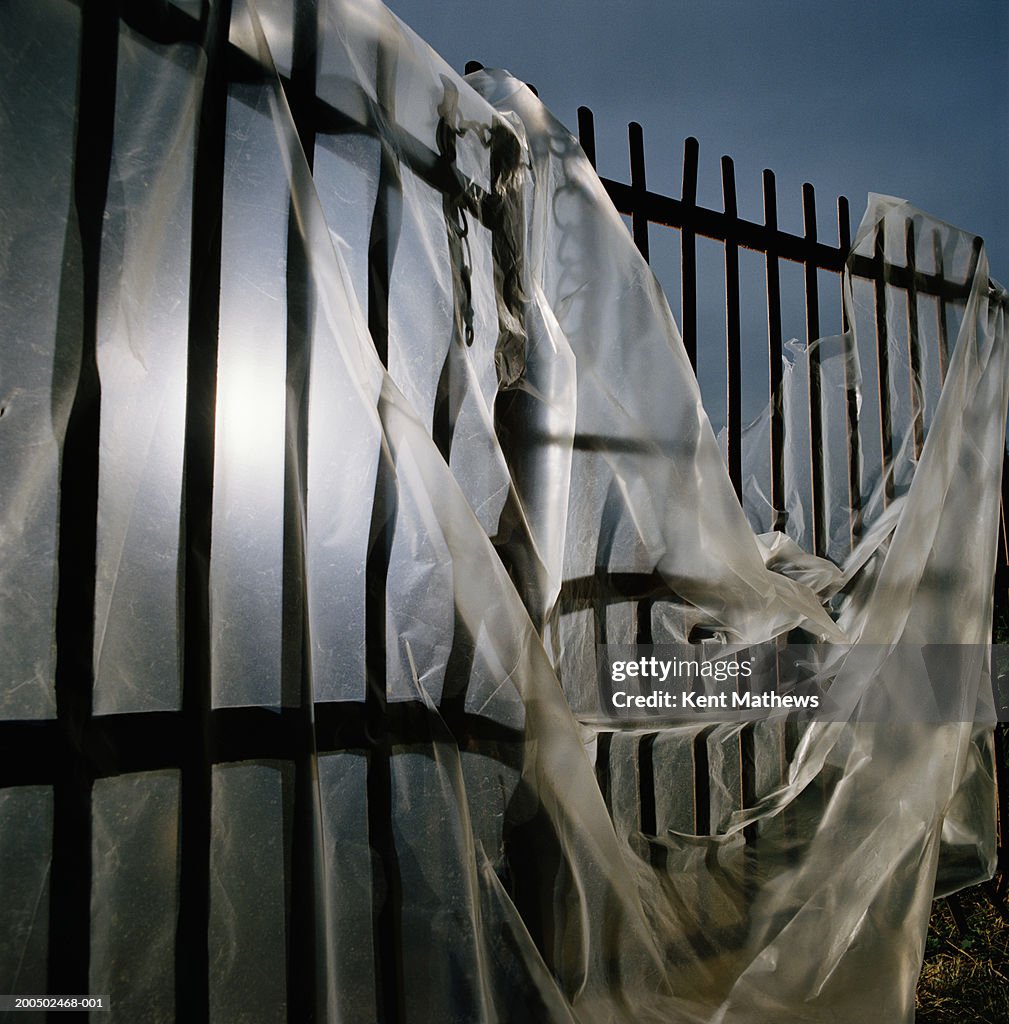 Fence draped in sheet