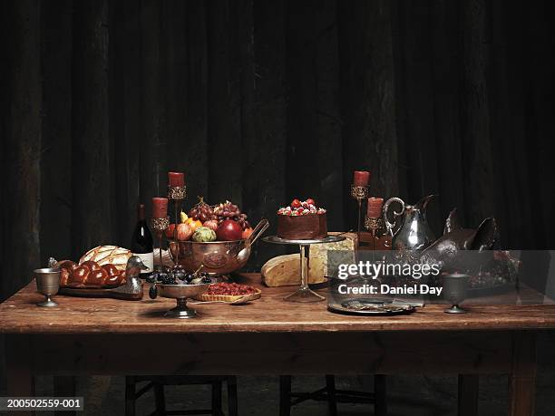 table set with large meal feast - banquet stockfoto's en -beelden