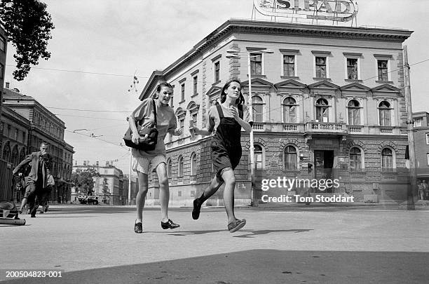 Bosnia, Sarajevo Two teenage girls grimace with fear as they sprint across an intersection on Sniper Alley. During the 47 months between the spring...