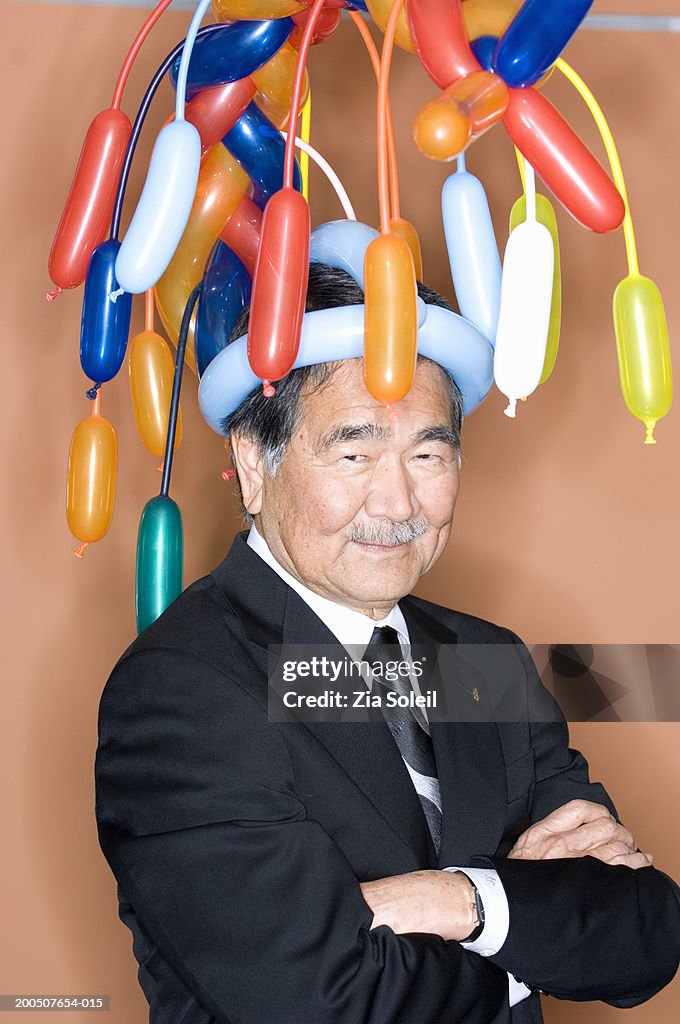 tackle Transportere ego Senior Businessman Wearing Balloon Hat Portrait Closeup High-Res Stock  Photo - Getty Images