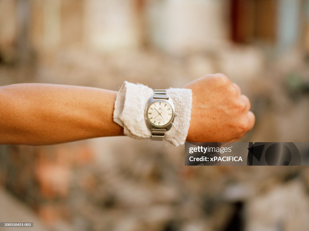 Man wearing wristwatch, close-up