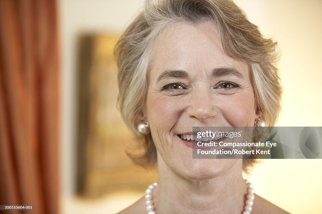 Mature woman smiling, portrait