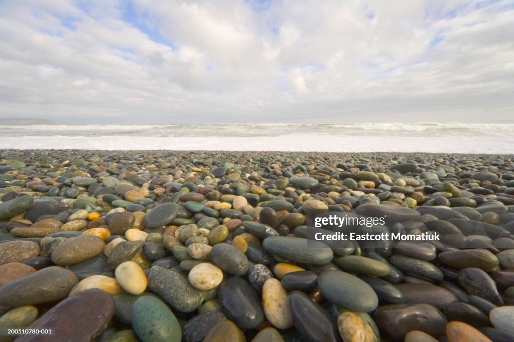 Rocky beach with waves breaking in background