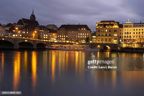 switzerland, basel, old town and river rhine at dusk (long exposure) - basel switzerland stock pictures, royalty-free photos & images
