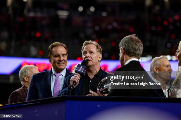 Commissioner Roger Goodell presents the Vince Lombardi trophy to Clark Hunt owner of the Kansas City Chiefs during Super Bowl LVIII at Allegiant...