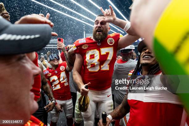 Travis Kelce of the Kansas City Chiefs celebrates in the locker room after winning Super Bowl LVIII against the San Francisco 49ers at Allegiant...