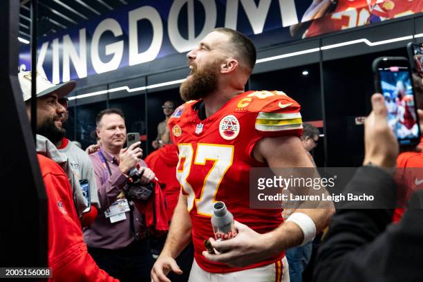 Travis Kelce of the Kansas City Chiefs celebrates in the locker room after winning Super Bowl LVIII against the San Francisco 49ers at Allegiant...