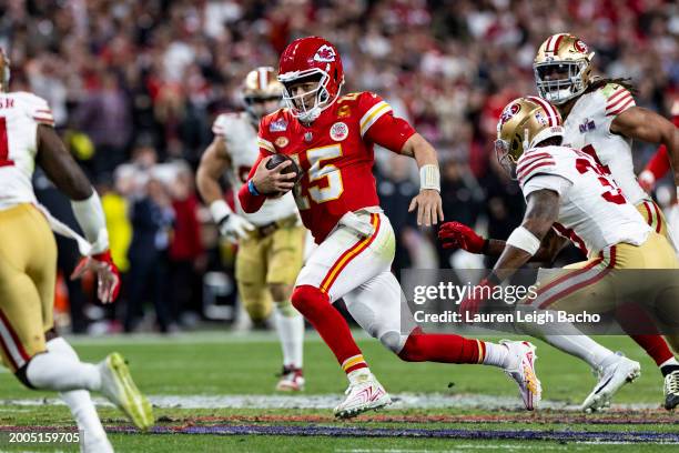 Patrick Mahomes of the Kansas City Chiefs runs the ball during Super Bowl LVIII against the San Francisco 49ers at Allegiant Stadium on Sunday,...