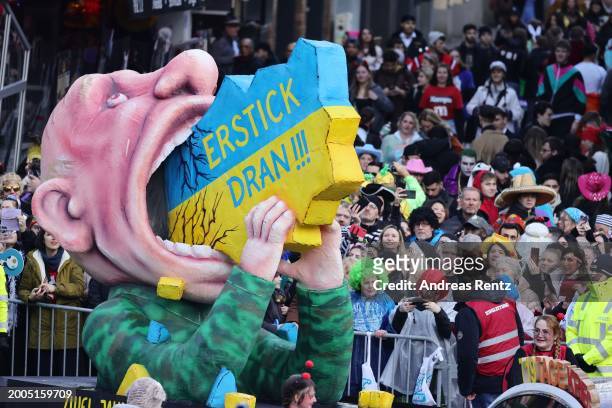 Parade float shows an effigy of Russian President Vladimir Putin at the annual Rose Monday Carnival parade on February 12, 2024 in Dusseldorf,...
