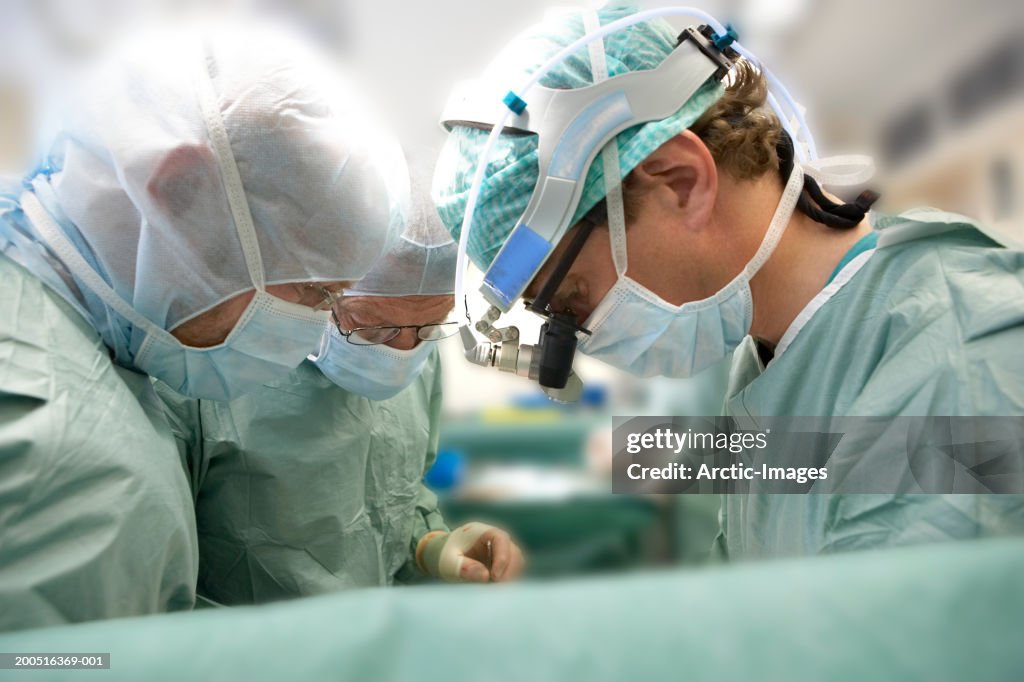 Surgeons performing Open Heart Surgery, close-up