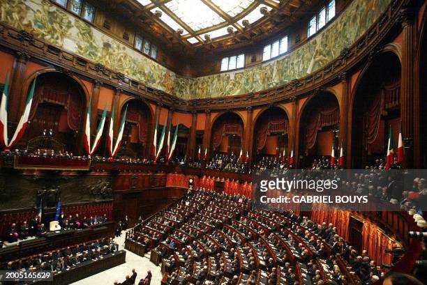Pope John Paul II delivers a speech at the Italian parliament in Rome 14 November 2002. The Pope became the first ever pontiff to address the Italian...