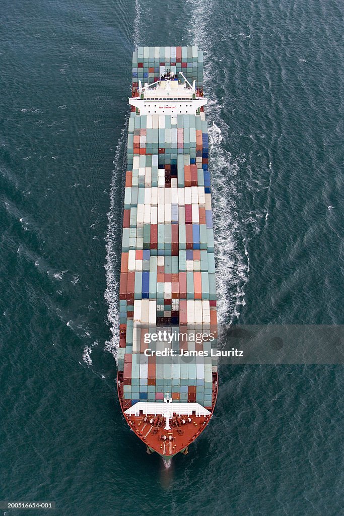 Container ship at sea, aerial view