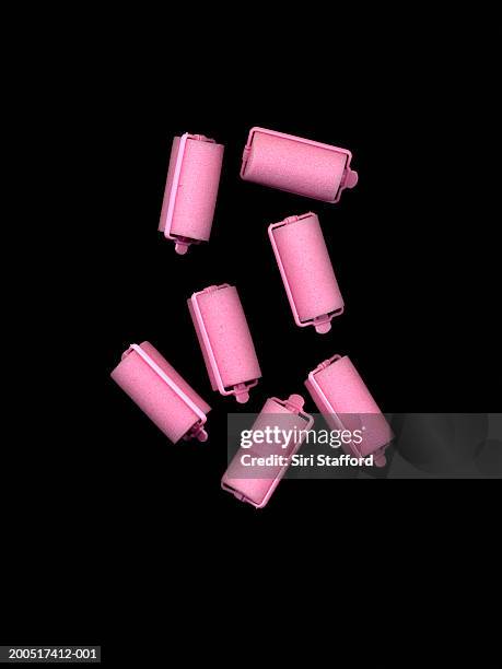 pink hair rollers - hair curlers stock-fotos und bilder