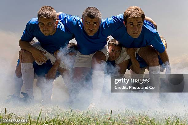 rugby players in scrum, ground view - rugby scrum stock pictures, royalty-free photos & images