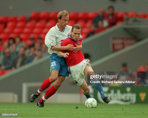 June 19: Dmitri Khokhlov of Russia and Pavel Nedved of Czech Republic during the UEFA Euro 1996 Group C match between Russia and Czech Republic at...