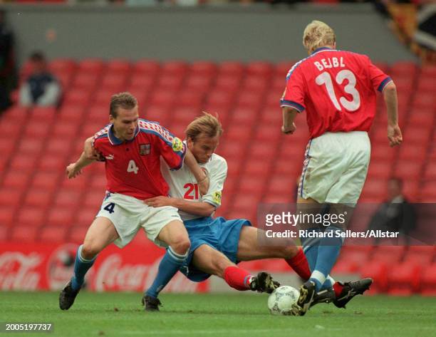 June 19: Dmitri Khokhlov of Russia, Pavel Nedved of Czech Republic and Radek Bejbl of Czech Republic challenge during the UEFA Euro 1996 Group C...