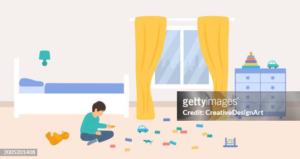 little boy sitting on the floor and playing with toys. child's room interior with bed, dresser and colorful toys - clutter stock illustrations