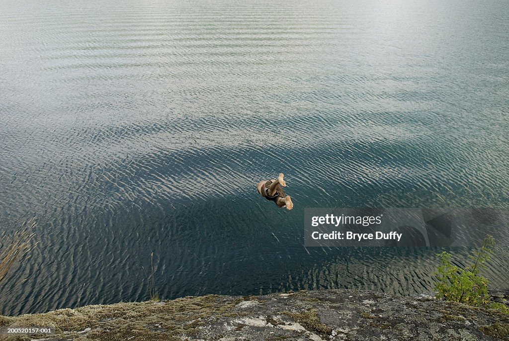Man diving into lake