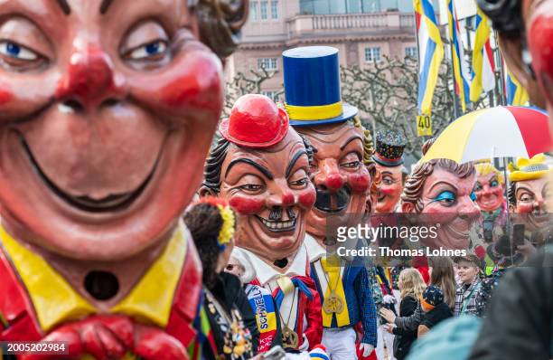 Meenzer Schwellkoepp' attend the annual Rose Monday Carnival parade on February 12, 2024 in Mainz, Germany. The Mainz and Dusseldorf Rose Monday...