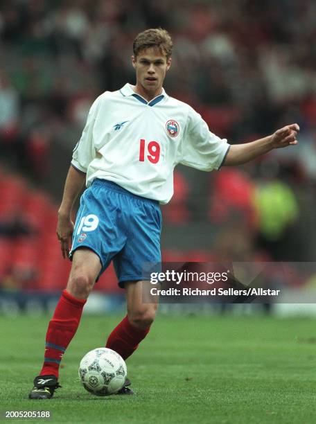 June 19: Vladislav Radimov of Russia passing during the UEFA Euro 1996 Group C match between Russia and Czech Republic at Anfield on June 19, 1996 in...