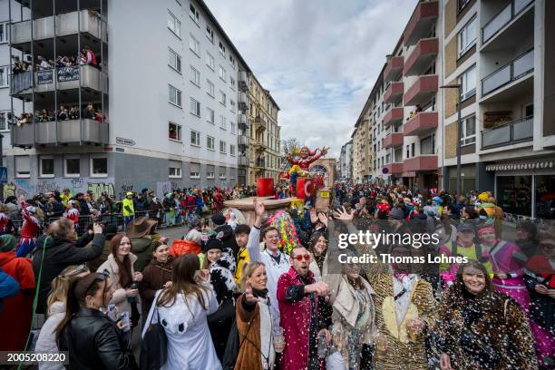 Spectators watch the annual Rose Monday Carnival parade on February 12, 2024 in Mainz, Germany. The Mainz and Dusseldorf Rose Monday parades are...