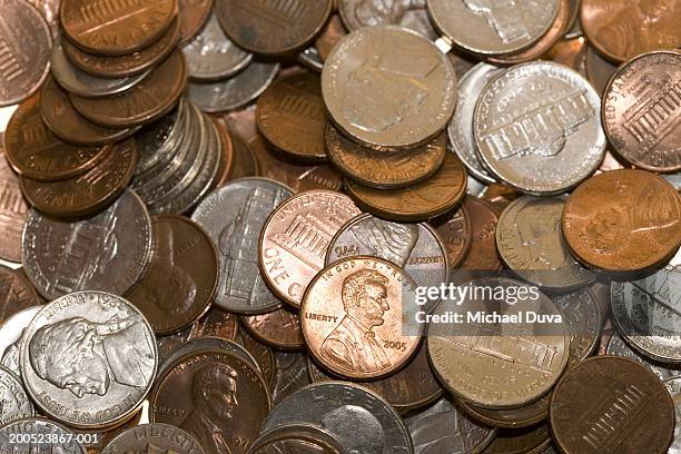 pile of coins, full frame - us penny stock pictures, royalty-free photos & images