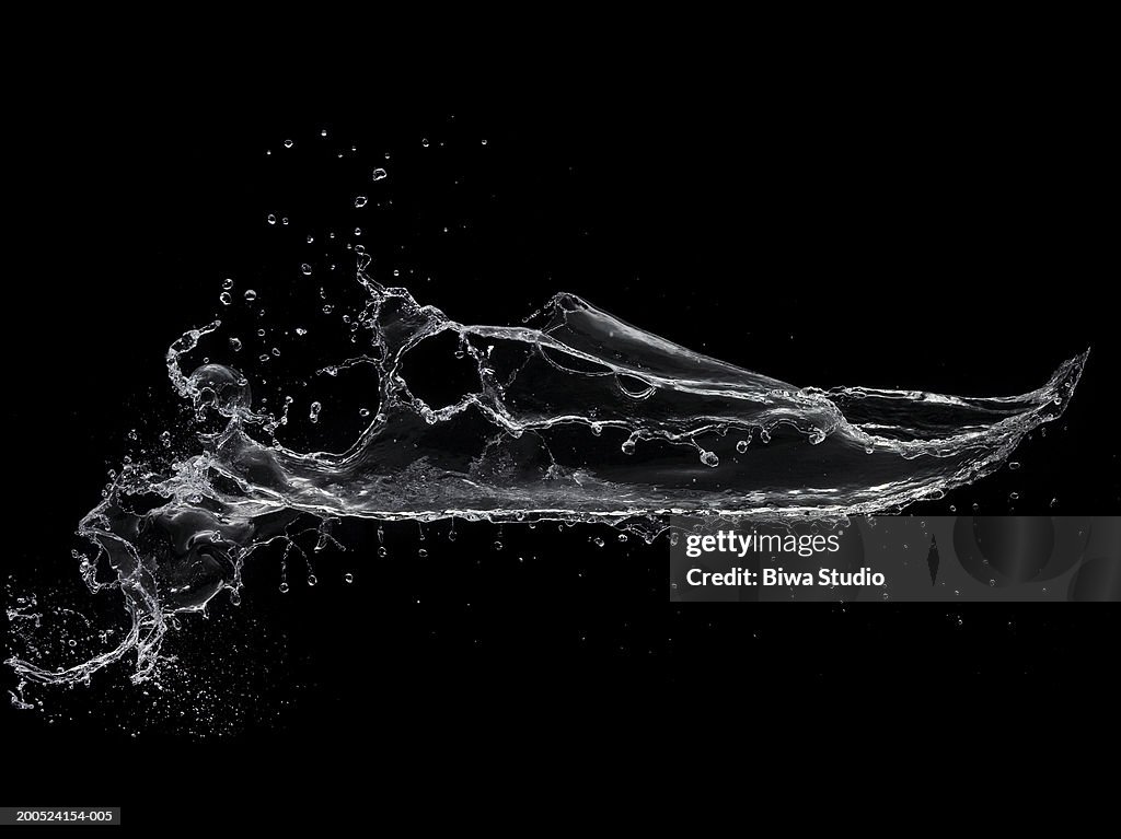 Splash of water on black background