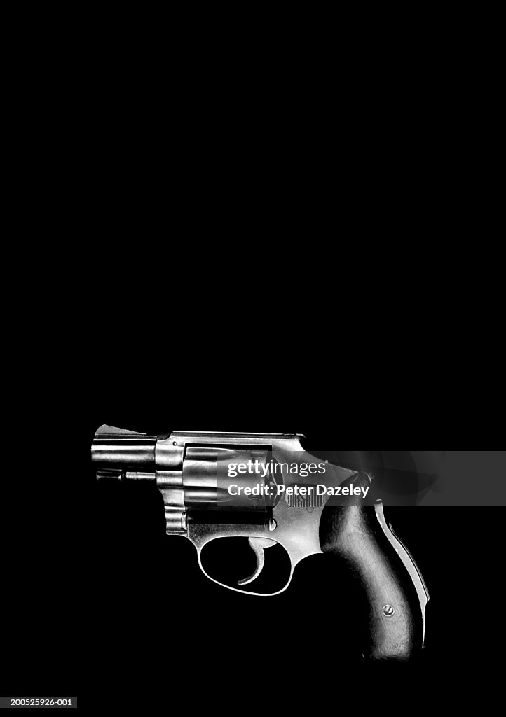 Handgun, black background