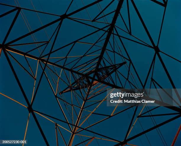 power line tower at night, view from below - electricity pylon stock pictures, royalty-free photos & images