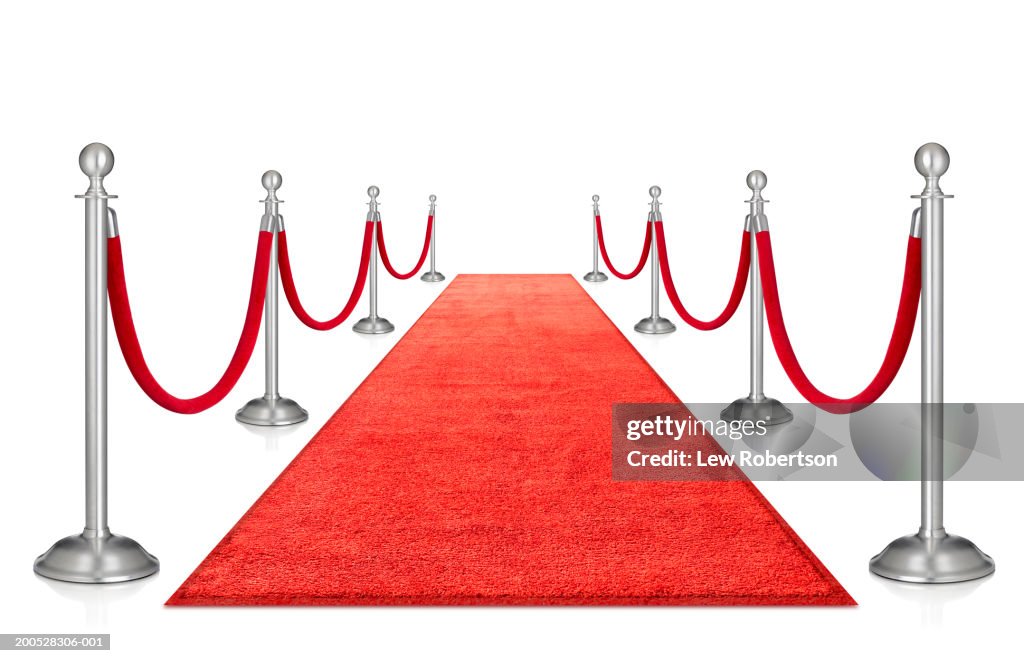 Red carpet and stanchions, against white background