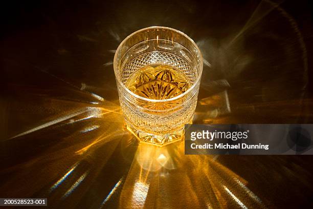 whiskey in whiskey glass, close-up - whiskey stock pictures, royalty-free photos & images