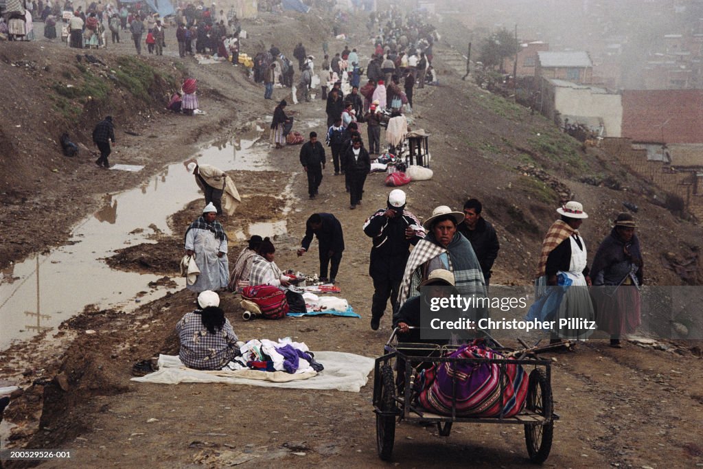 Bolivia, La Paz, El Alto, people at market on hill top...