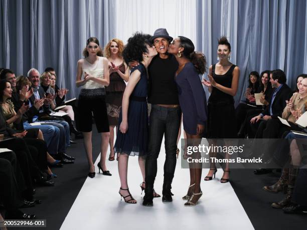 female models kissing designer on cheek on catwalk - 16 year old male model stock pictures, royalty-free photos & images