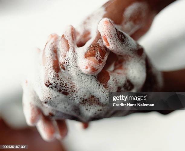 man washing hands, close-up - foam hand stockfoto's en -beelden