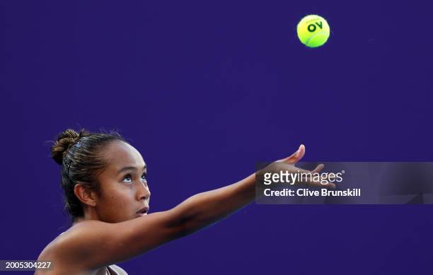 Leylah Fernandez of Canada serves against Liudmila Samsonova in their first round women's singles match during the Qatar TotalEnergies Open, part of...