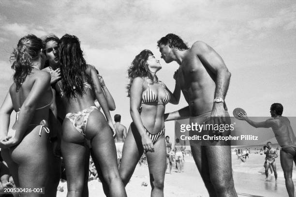 Mar 1994, Pepe Beach. Brazil, Rio de Janeiro, people on beach .