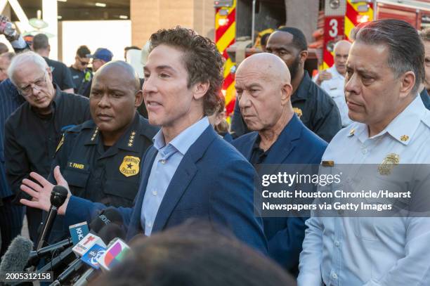 From left, Police Chief Troy Finner, Lakewood Church pastor Joel Osteen, Mayor John Whitmire and Fire Department Chief Samuel Pena, participate in a...