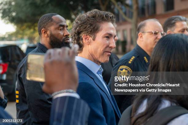 Lakewood Church pastor Joel Osteen listens to comments at a press conference during an active shooter event at the church Sunday, Feb. 11, 2024.