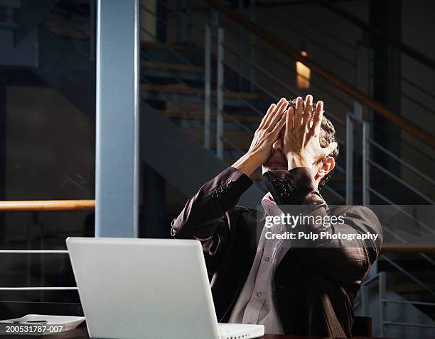Covering Eyes Computer Photos and Premium High Res Pictures - Getty Images