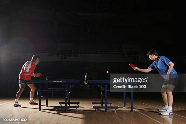 two young men playing table tennis, side view - asian championship bildbanksfoton och bilder