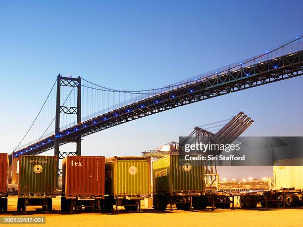 shipping containers atop trailers at port - port of los angeles imagens e fotografias de stock