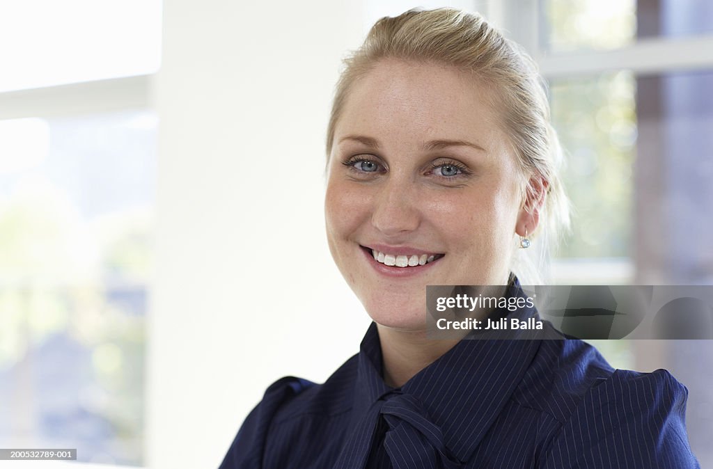 Woman smiling, portrait, close-up