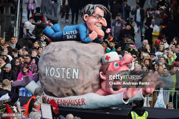 Parade float shows an effigy of German Health Minister Karl Lauterbach at the annual Rose Monday Carnival parade on February 12, 2024 in Dusseldorf,...